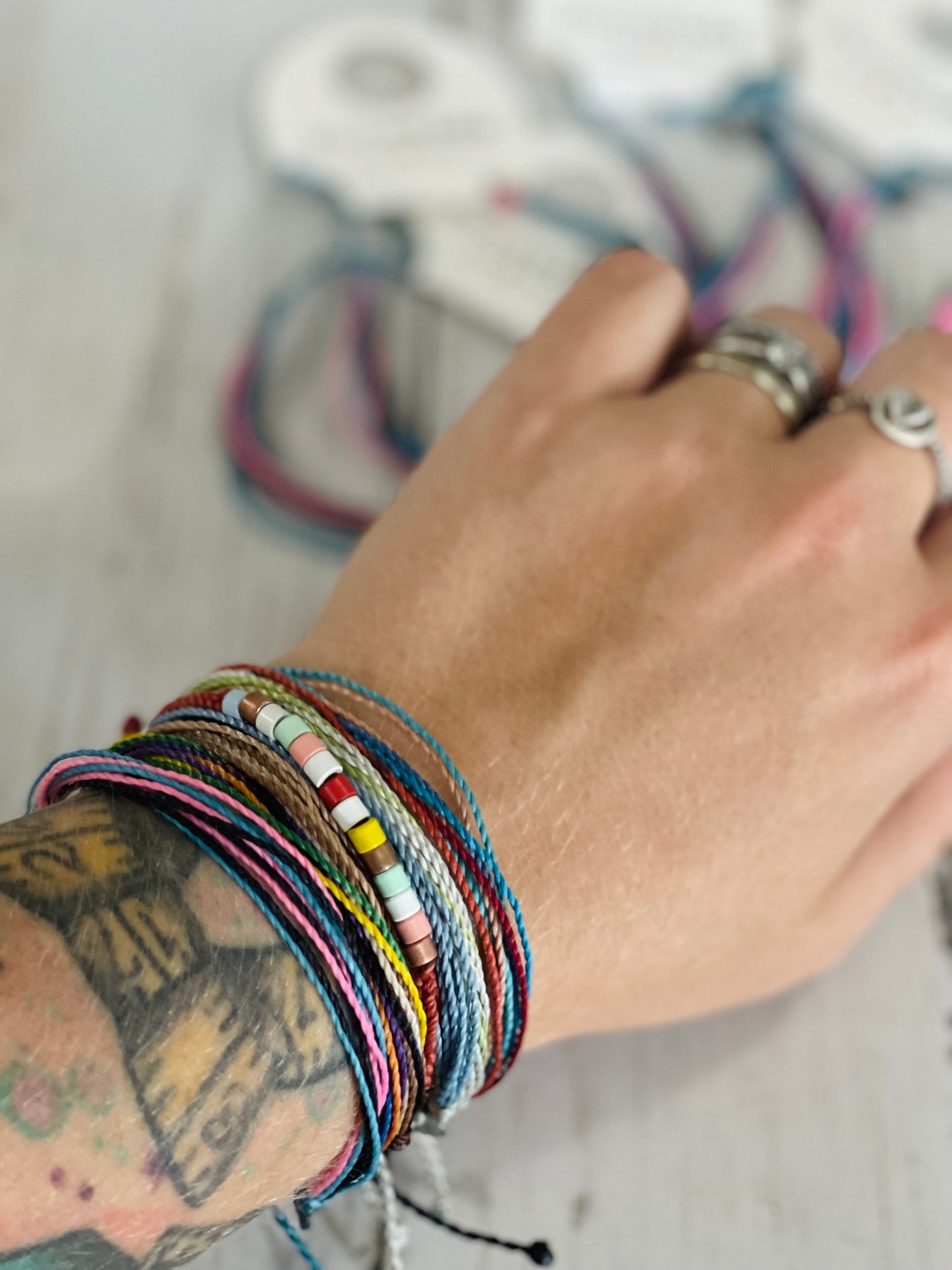 Exclusive RockerBye Pura Vida bracelets plus fundraiser donation retail swag