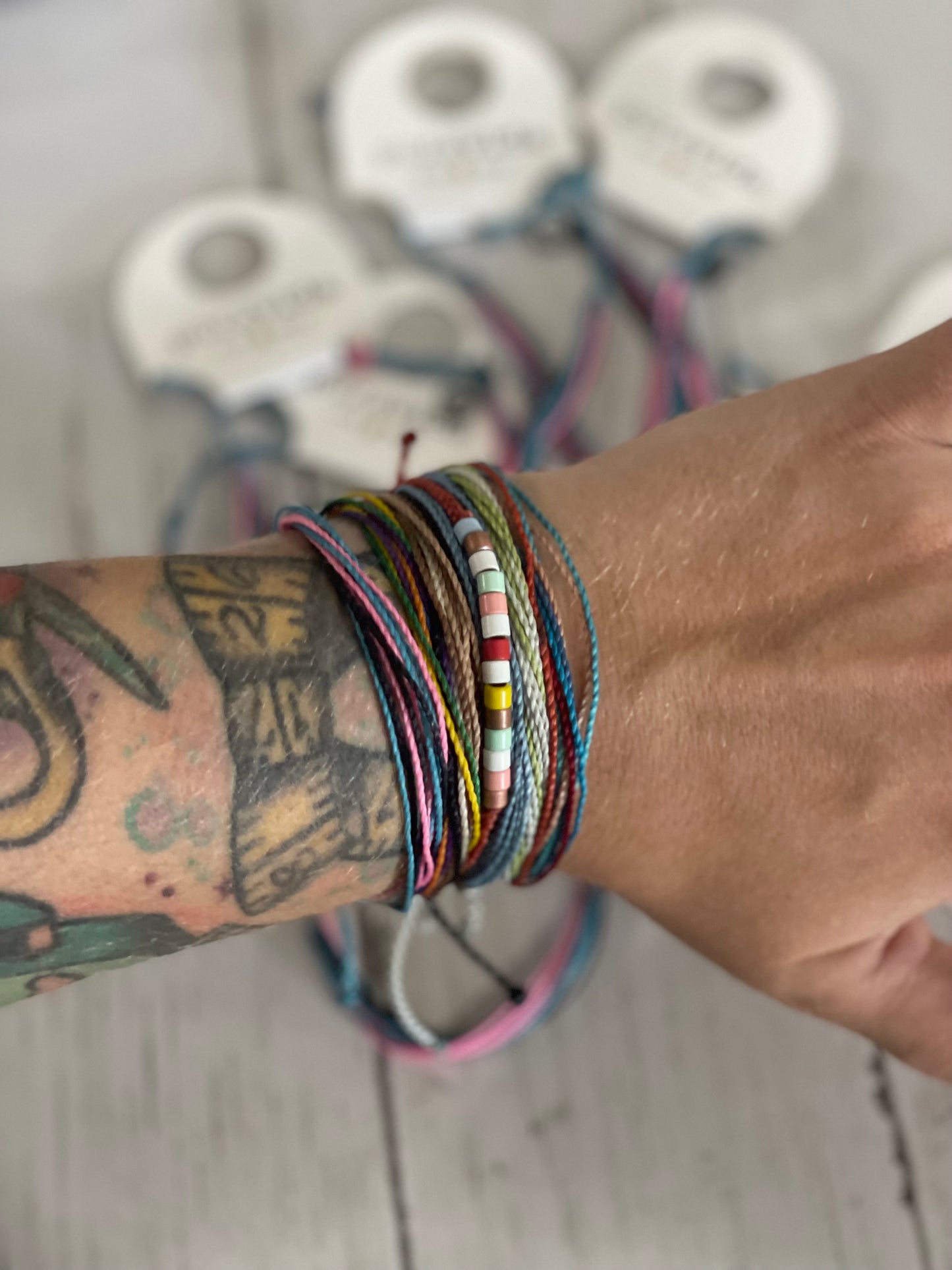 Exclusive RockerBye Pura Vida bracelets plus fundraiser donation retail swag